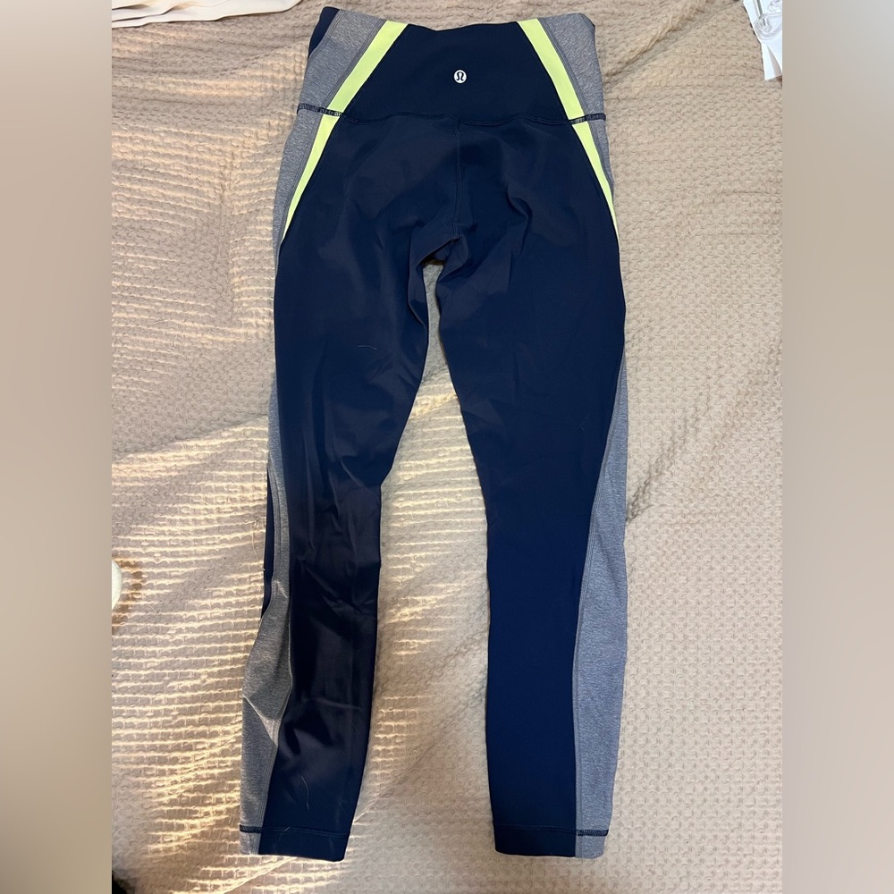 Matching Lululemon set. Size 6. Blue with grey and neon yellow detailing.